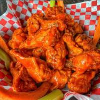 8 Wings · Crispy Chicken Wings, Tossed in choice of sauce. Served veggie sticks, fries, side ranch