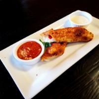 Pepperoni Roll · Pizza Dough Roll Stuffed with Pepperoni, Mozzarella and Italian Herbs. Served with Marinara