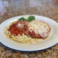 Chicken Parmigiana · Crispy Chicken  Breast Topped with home Made Marinara Sauce and Mozzarella Cheese. Served Sp...