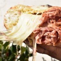 Ham ＆ Cheese Calzone · Chopped Ham, Mozzarella and Homemade Marinara Sauce