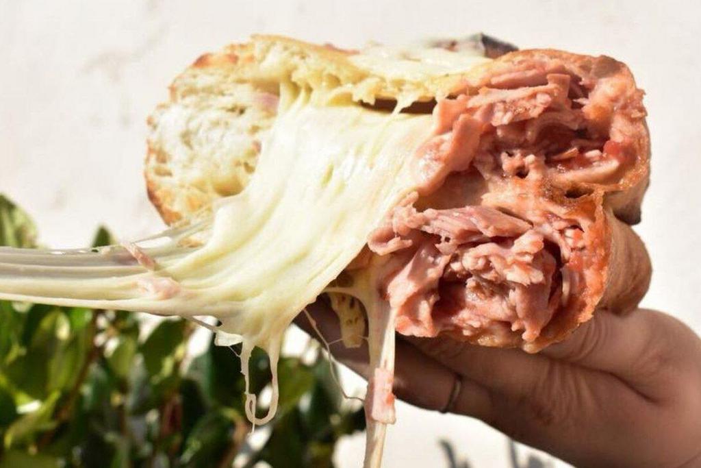 Ham ＆ Cheese Calzone · Chopped Ham, Mozzarella and Homemade Marinara Sauce