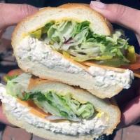 Large Tuna Salad · Comes with Mustard, Mayo, Lettuce, Tomatoes, Pickles, Pepperoncinis and Onions