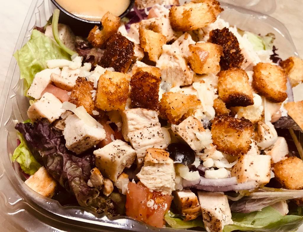 Grilled Chicken House Salad · Spring Mix & Hand Chopped Romaine, 4oz Portion of Grilled Chicken, Sliced Black Olives, Diced Tomatoes, Sliced Red Onions, Croutons and a little Freshly Shredded Mozzarella Cheese.
Served with your choice of two 2oz sides of dressing, always served on the side.