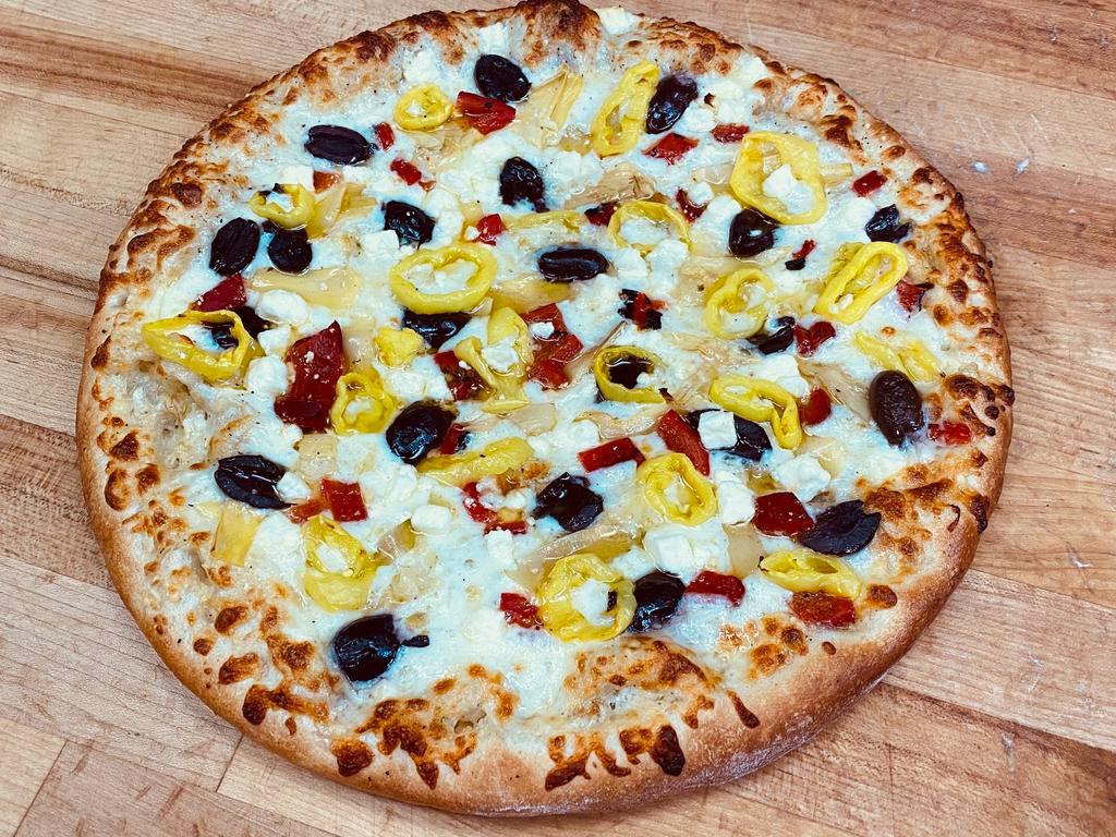 *NEW* Mediterranean Veggie Pizza · White or Red Sauce, Freshly Shredded Mozzarella, Marinated Artichokes, Roasted Red Peppers, Kalamata Olives and Pickled Banana Peppers topped w/ a little Feta Cheese.