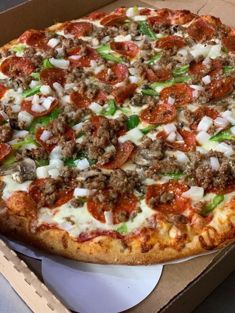Corner Deluxe Pizza · Our Homemade Red Pizza Sauce, Freshly Shredded Mozzarella, Fresh Green Peppers, Fresh Mushrooms, Traditional Pepperoni, Italian Sausage Crumbles and Diced Yellow Onions. Topped with extra Mozzarella & Romano Cheese. 