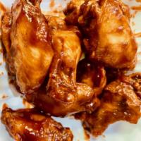 6 Piece Bone-In Chicken Wings  · 6pc Bone-In Chicken Wings Tossed in One of Our Signature Wing Sauces of your Choice.
Served ...