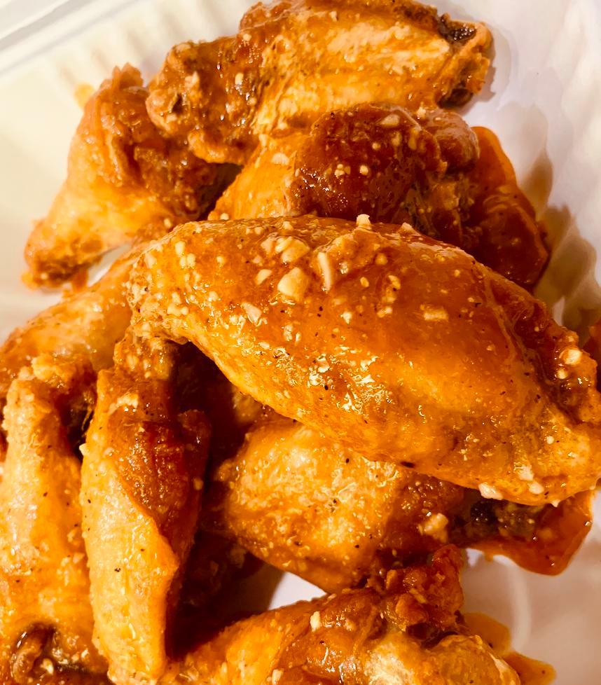 10 Piece Bone-In Chicken Wings · 10pc Bone-In Chicken Wings Tossed in One of Our Signature Wing Sauces of your Choice.
Served with Celery & One 2oz side of Our Homemade From Scratch Bleu Cheese.
( sorry, no split saucing )