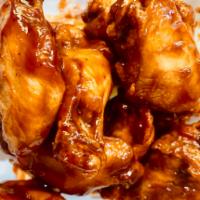 20 Piece Bone-in Chicken Wings · 20pc Bone-in Chicken Wings Tossed in One of Our Signature Wing Sauces of your Choice.
Served...