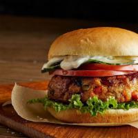 Salmon Burger & Tots Box · Sustainable Pan Seared Alaskan Wild Salmon, Blackened Seasoning, Lettuce, Tomato, Tartar Sau...