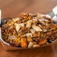 BBQ Pulled Pork Fries or Tots · Freshly pulled pork, memphis sweet bbq sauce, sauteed onions, cheddar cheese on seasoned fri...