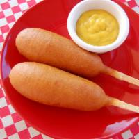 Corn Dogs · Batter Wrapped full-size corn dogs