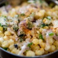 Street Corn · Fresh Corn Removed From The Cob In House, Cotija Cheese, Mayo, Chile Powder and Lime