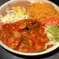 Camarones a la Ranchera · Prawns in our special sauce, sauteed with bell peppers and onions. Served with lettuce, guac...