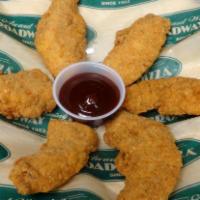 Chicken Tenders · Premium chicken tenderloins breaded and served with your choice of sauce.