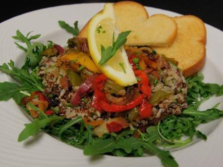 Protein Power Bowl (Vegan) · Who ever heard of a hot salad? Our salad blend of healthy grains (red rice, brown rice, red quinoa and black barley) topped with sautéed peppers, onion, kale and arugula with a kiss of lemon.  Add grilled or crispy chicken for $3.00.  Substitute gluten free garlic toast for $1.00.