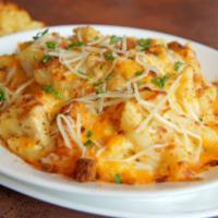 Baked Mac & Cheese · Cavatappi noodles and bacon tossed in a combination of Monterey jack, mozzarella, parmesan, ...