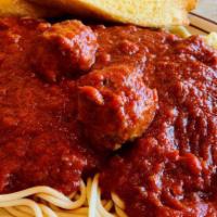 Plant-Based Spaghetti & Meatballs (Vegan) · Three homemade “no-meat meatballs” over traditional spaghetti noodles topped with a zesty to...