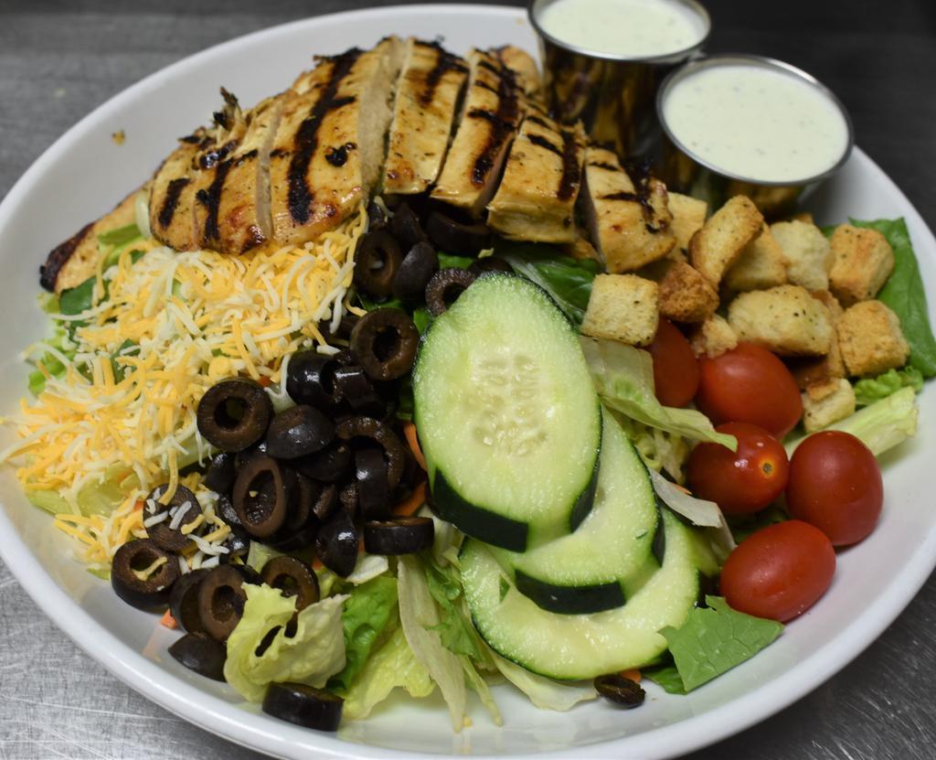 The Bombshell Salad · BBQ ranch chicken salad lettuce, tomatoes, corn,black beans and fresh cucumbers with our BBQ ranch dressing. Then we top off with grilled or fried chicken, avocado and fried onion straws.