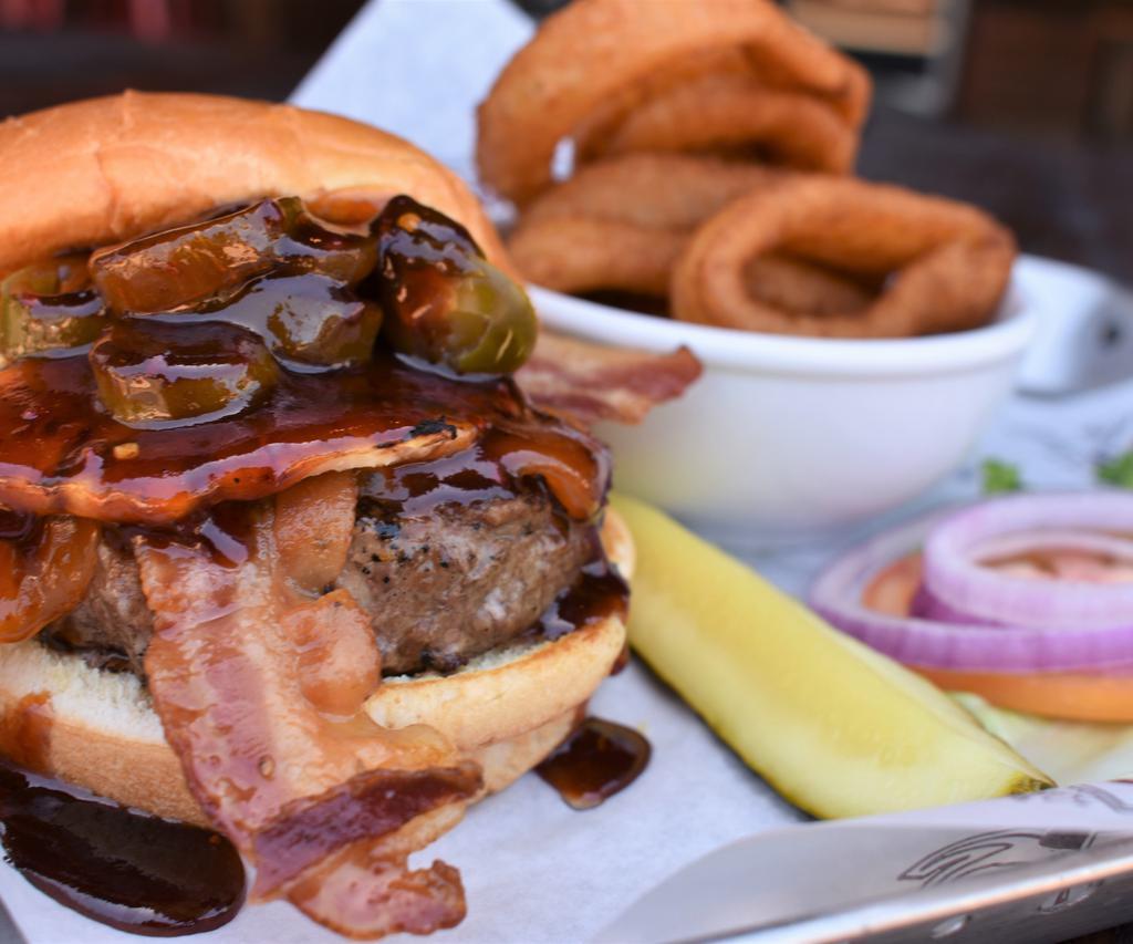 Pearl Harbor Burger · Served with bacon, jalapenos, pineapple, lettuce, tomato, onion and our sweet n spicy BBQ sauce.