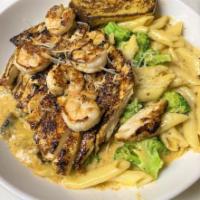Renegade Pasta · A little Cajun flairi penne pasta tossed in a creamy spiced Alfredo sauce with fresh broccol...