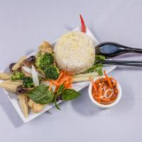 R15. Veggie Rice · Steamed white rice serve huhd with fried tofu, broccolis, tomatoes, lettuce, cucumbers, basi...