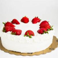 Strawberry Cake · Vanilla sponge cake layered with fresh strawberries and whipping cream. Decorated with fresh...