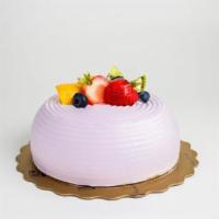 Taro Cake · Vanilla sponge cake layered with fresh taro puree and covered with vanilla whipped cream.