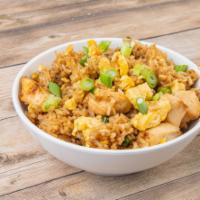 Arroz Chaufa de Pollo · Peruvian Chinese style chicken fried rice, fried in a wok to very high temperatures with ses...