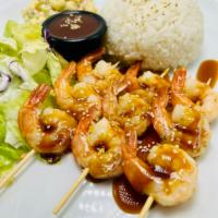 Shrimp Skewer Teriyaki  ·  Teriyaki Sauce with Sesami seeds. Comes with macaroni salad. Side of Steam Rice. Side of Ga...