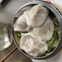 5 Piece Dumplings · Served with vegan soy vinaigrette.