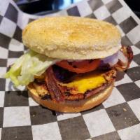Rodeo Chicken Breast Sandwich · Charbroiled 7 oz. chicken breast tossed in BBQ sauce, topped with bacon, American cheese, le...