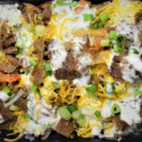 Loaded Fries · Hand cut fries, chopped beef, spring onions, Cheddar Cheese, Ranch Dressing