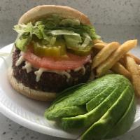 The Beyond Burger · Beyond burger patty with iceberg lettuce and tomato ,slice pickles ,vegan shred-it mozzarell...