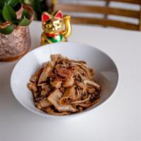 Char Kuey Teow (Stir Fried Rice Noodle) · Fresh local rice noodles, egg, sausage, shrimp, bean sprouts, onion, black garlic sauce