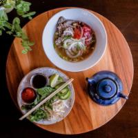Beef Pho · Braised beef broth, shaved beef slices, phở noodles, onion, cilantro, bean sprouts, Thai bas...