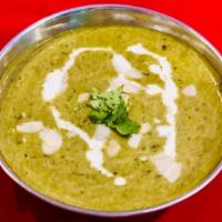 Methi Malai Mutter · Fenugreek leaves, green peas cooked in a creamy sauce.