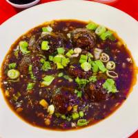 Vegetable Manchurian (Gravy) · Entree fried patties of chopped vegetables cooked in manchurian sauce.