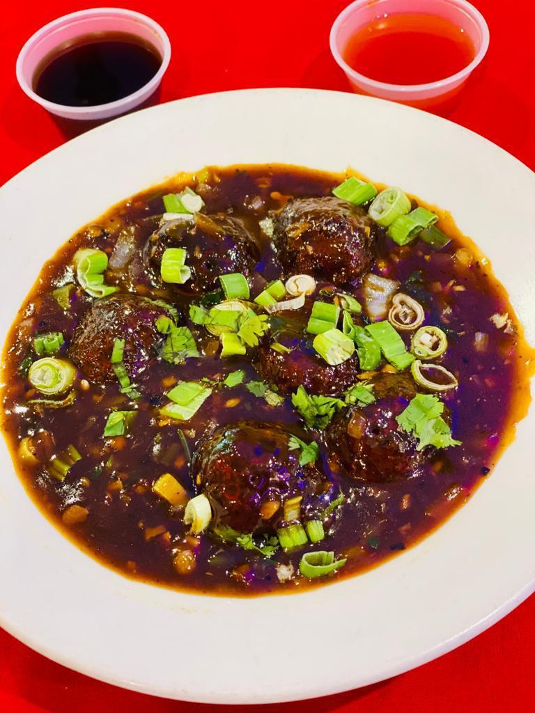 Vegetable Manchurian (Gravy) · Entree fried patties of chopped vegetables cooked in manchurian sauce.