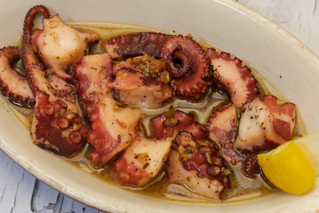 Grilled octopus · With butter, lemon, garlic