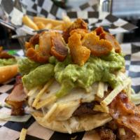 Super Burger · 8oz 100% prime angus beef, cheese, bacon, fried egg, guacamole, fried pork belly, lettuce to...