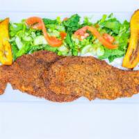 Milanesa de Carne · Breaded steak, rice, beans, sweet plantain and salad.