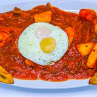 Bistec a Caballo · Steak, rice, beans, sweet plantain and salad.