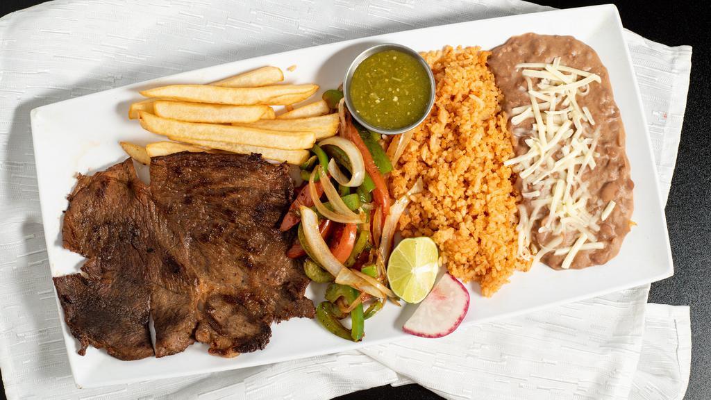 Plato de Carne Asada · Seasoned carne asada, grilled onions and bell peppers. Served with a side of fries.