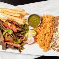 Asada Fajitas Plate · Asada grilled and diced with grilled onion and bell pepper and your choice of flour or corn ...