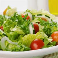 Green Salad · Lettuce, tomatoes, cucumbers and onions served with a lemon wedge. 