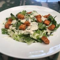 Caesar Salad · Romaine lettuce, creamy Caesar dressing and homemade croutons. Add grilled chicken breast fo...