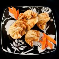 6 Pieces Crab Rangoon · Cream cheese and imitation crab meat filling, wrapped in wonton skin, deep fried and served ...