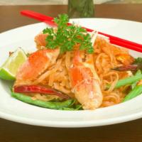 Spicy Crab Noodle · Rice noodle, egg, (4) crab claws, garlic, scallion, roasted chili. Spicy.