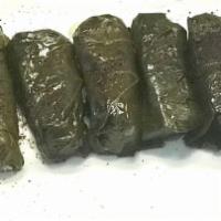 Dolma · 5 pieces. Grape leaves stuffed with rice and assorted herbs and spices.