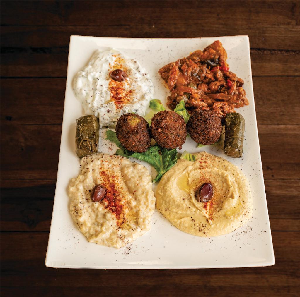 Combo Appetizer · Combination of hummus, baba ganoush, dolma, haydari, falafel and sauteed eggplant. Served with pita bread.